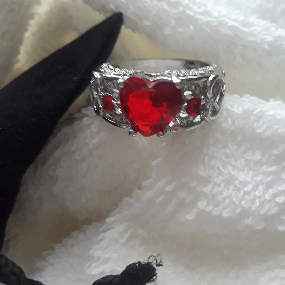 Silver plated Ruby red heart ring.